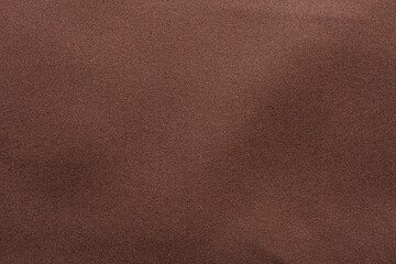 brown fabric texture background closeup