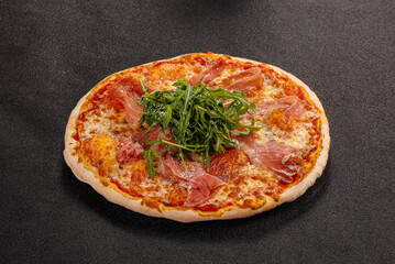 Pizza with parma and rucola