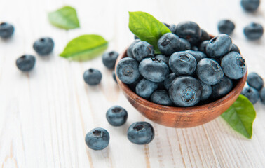 Blueberries on old wooden background