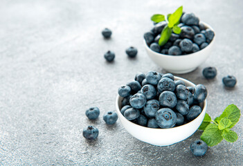 Blueberries on concrete background