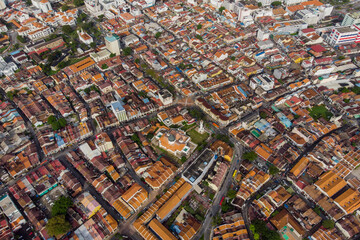 Aerial view image colorful heritage houses rooftop and streets in Georgetown Penang, Malaysia. Directly above view.