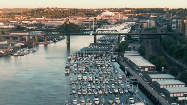 Aerial: Downtown Tacoma and Foss Waterway at sunset, Washington, USA