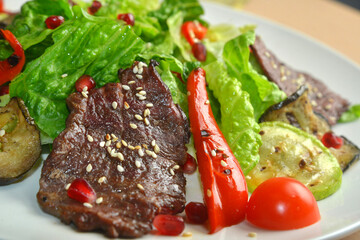 fresh salad with meat and tomatoes