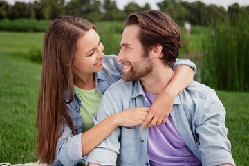 Fototapeta premium Photo of smiling cheerful good mood lovely married couple hug embrace each other celebrate anniversary outdoors