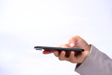 Businessman using smartphone on white background and technology connection concept