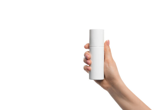 Aerosol container in a female hand on a white background