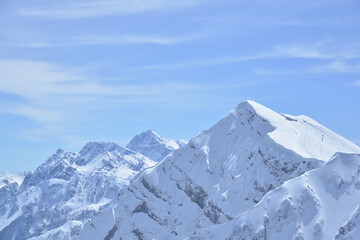 Fototapeta na wymiar Snow Mountain Landscape with Blue Sky from Russia, rosa khutor, sochi