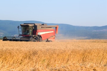 combine harvester working on a field