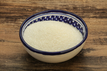 White sugar in the bowl