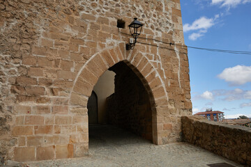 Roman arch in the Jewish quarter of the city of Medina de Pomar. Castilla y Leon, Burgos, Spain