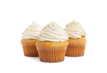 Delicious cupcakes decorated with cream on white background
