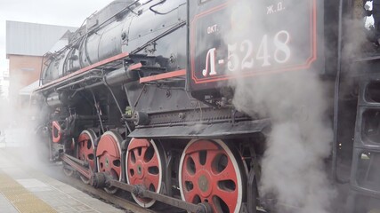 Wheels of an old Soviet steam locomotive.