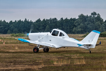 Airplane for processing agricultural fields prepares for takeoff