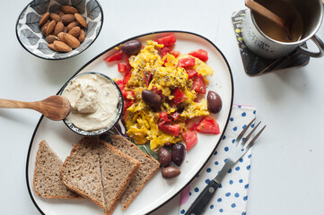 Egg plate breakfast, cocoa and almonds
