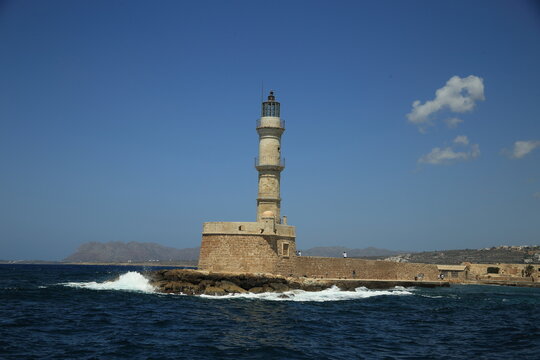 Venetian lighthouse in the port of Chania on the northern coast of the Greek island of Crete. High quality photo