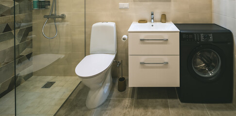Modern interior of bathroom in apartment. Toilet and shower.