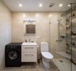Modern interior of bathroom in apartment. Toilet and shower.