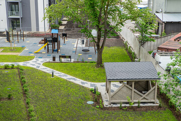 The courtyard of modern new residential building with playground.