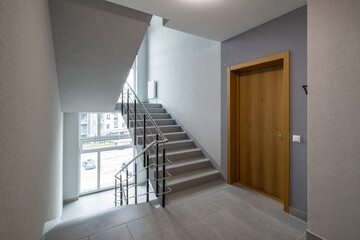 Modern interior of new entrance in residential building.