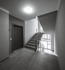 Modern interior of new entrance in residential building.