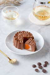 A mooncake pudding is a Chinese bakery product traditionally eaten during the Mid-Autumn Festival. The Mid-Autumn Festival is widely regarded as one of the four most important Chinese festivals.
