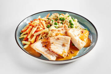 Fillets of succulent cichlid freshwater fish with mixed veggies