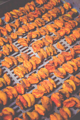 The process of home cooking dried fruits in an electric dryer.