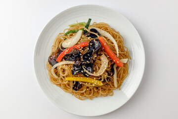 Japchae on a white background