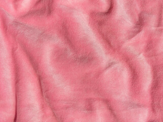 Pink color velvet fabric texture top view. Female blog rose velour tactile background. Smooth soft fluffy velvety satin cloth metallic shiny material.Elegant luxury wallpaper for girls fashion website