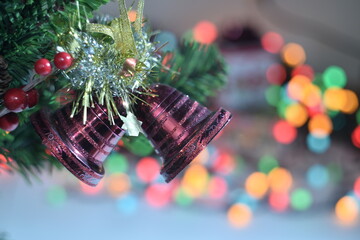 Decorated Christmas tree on blurred, sparkling and fairy background