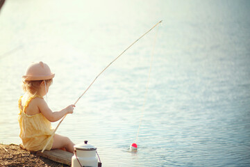 child on the lake fishing summer beauty