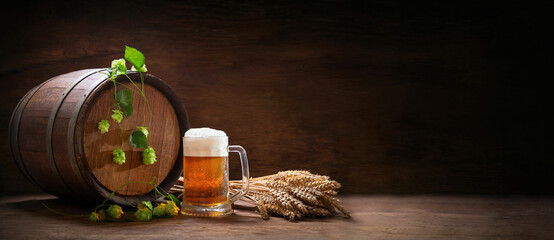 mug of beer, wheat ears, hops and beer barrel
