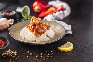 curry chicken meat with rice spices tomato sauce cuisine meal snack on the table copy space food background rustic 