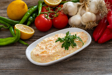 Carrot salad is prepared with grated carrots, garlic and yogurt. Traditional turkish cuisine
