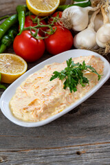 Carrot salad is prepared with grated carrots, garlic and yogurt. Traditional turkish cuisine