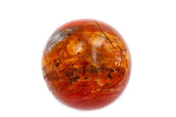 Macro mineral stone jasper ball on white background