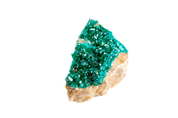 Macro mineral stone Dioptase silicate copper on a white background