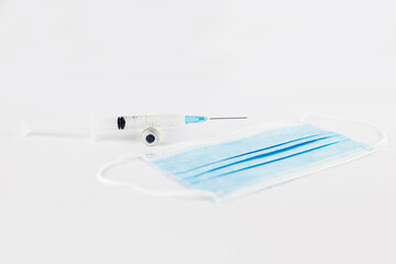 Vaccine injection and a surgical mask