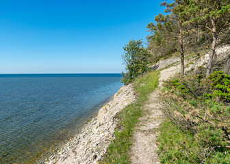 coastal sea view from Panga cliff, blue sky and sea, summer, beautiful view of wild romantic coastal cliff landscape at the Baltic Sea at Tagalaht Bay, Saremma Island, Estonia