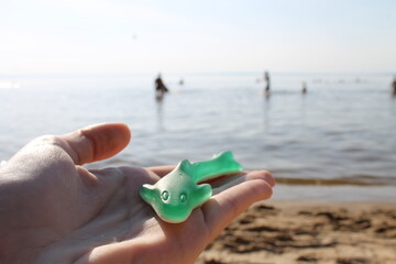 child playing on the beach