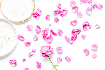 Spring trendy disign with flowers on white table background top view mock up