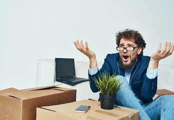 business man at office packing things new place of work