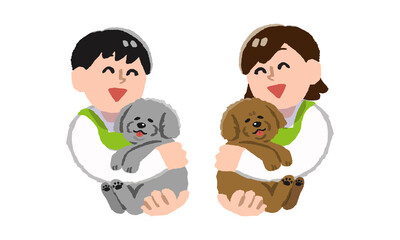 犬を抱っこするエプロンを着用した店員の男女