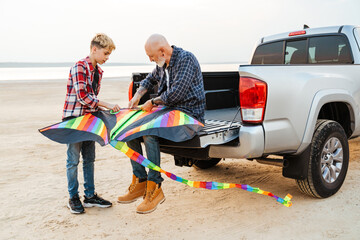 Father and his teenage son having fun