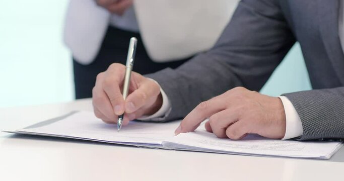 Successful business people signing a contract in office room,4K
