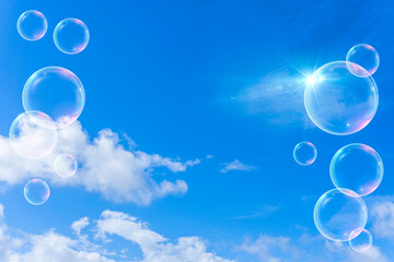 太陽の日差しと青空と雲とバブルの背景素材_c_06