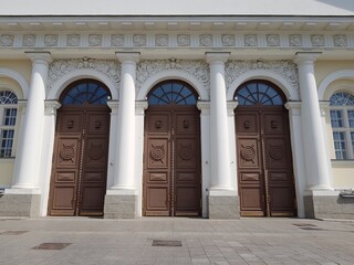 Three wooden door in an old building