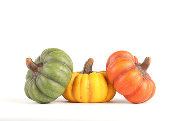 Pumpkins made out of clay isolated on white