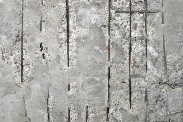 Concrete texture. Concrete texture background for background in black, grey and white colors.Reinforced concrete with damaged and rusty metallic reinforcement.Grey concrete texture.