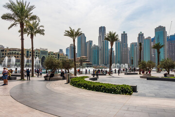 Fototapeta na wymiar Dubai, UAE - 12.12.2020 Spectators enjoying Dubai fountain show. Travel